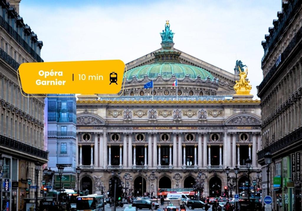 a large building with a sign in front of it at 235 Home Madrid Concept in Paris