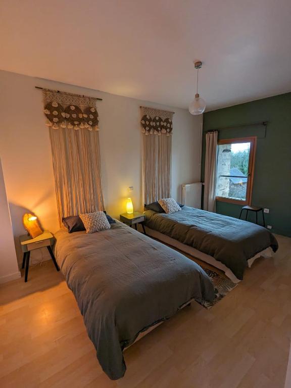 Postel nebo postele na pokoji v ubytování Ecolodge La Belle Verte