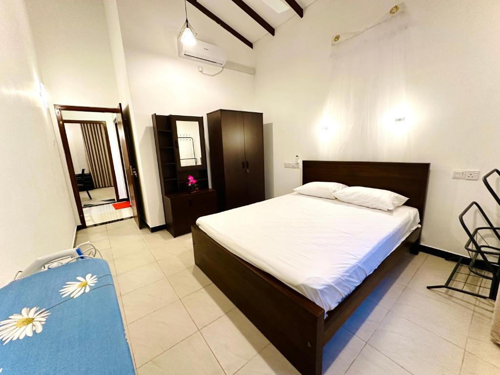 Postel nebo postele na pokoji v ubytování Serene Bliss Villa