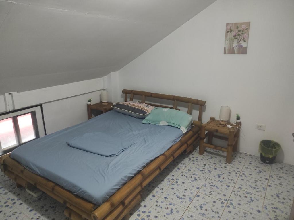 Кровать или кровати в номере Koa's Beach house