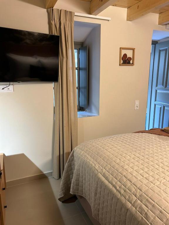 Postel nebo postele na pokoji v ubytování Living Yard Acropolis