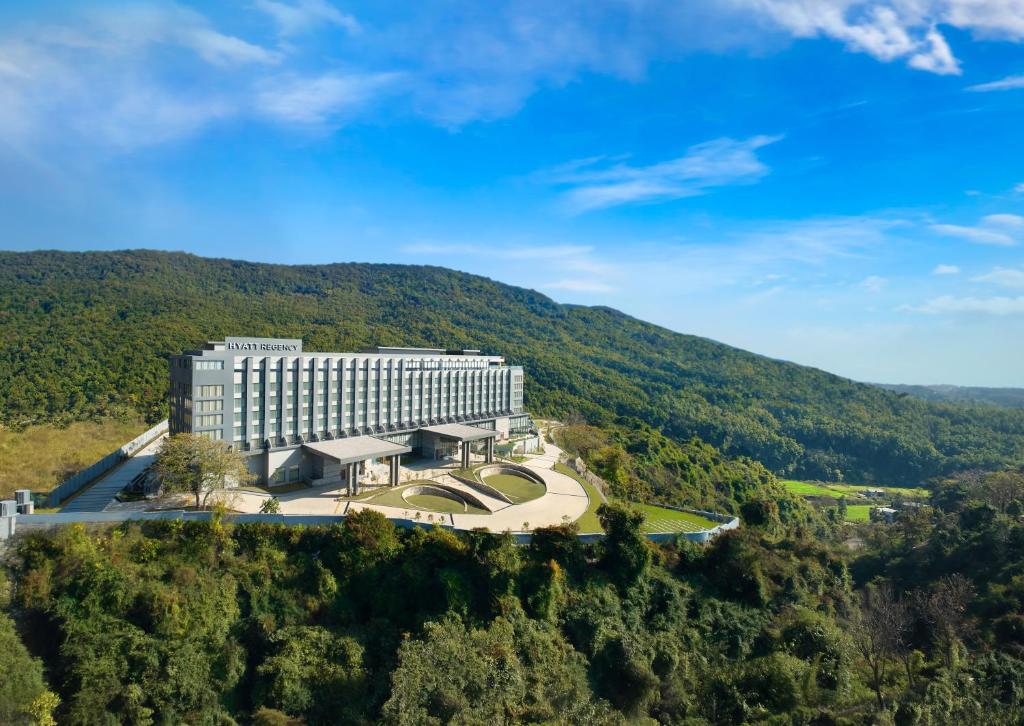 an aerial view of a building on a mountain at Hyatt Regency Dehradun Resort and Spa in Dehradun