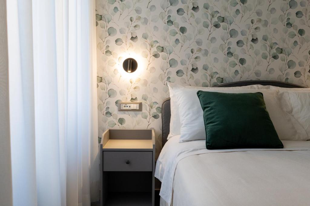 Postel nebo postele na pokoji v ubytování Damatti Room