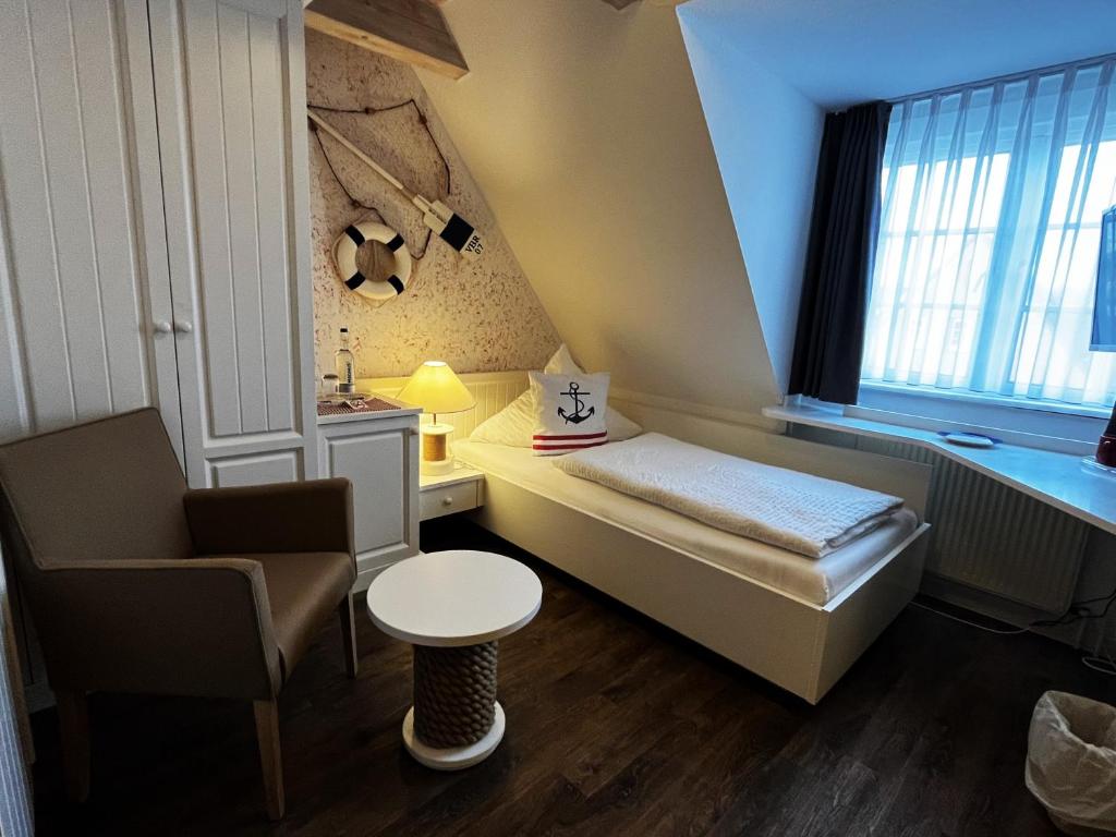 Postel nebo postele na pokoji v ubytování Hotel Anka