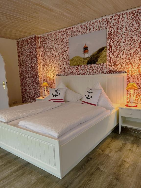 Postel nebo postele na pokoji v ubytování Hotel Anka