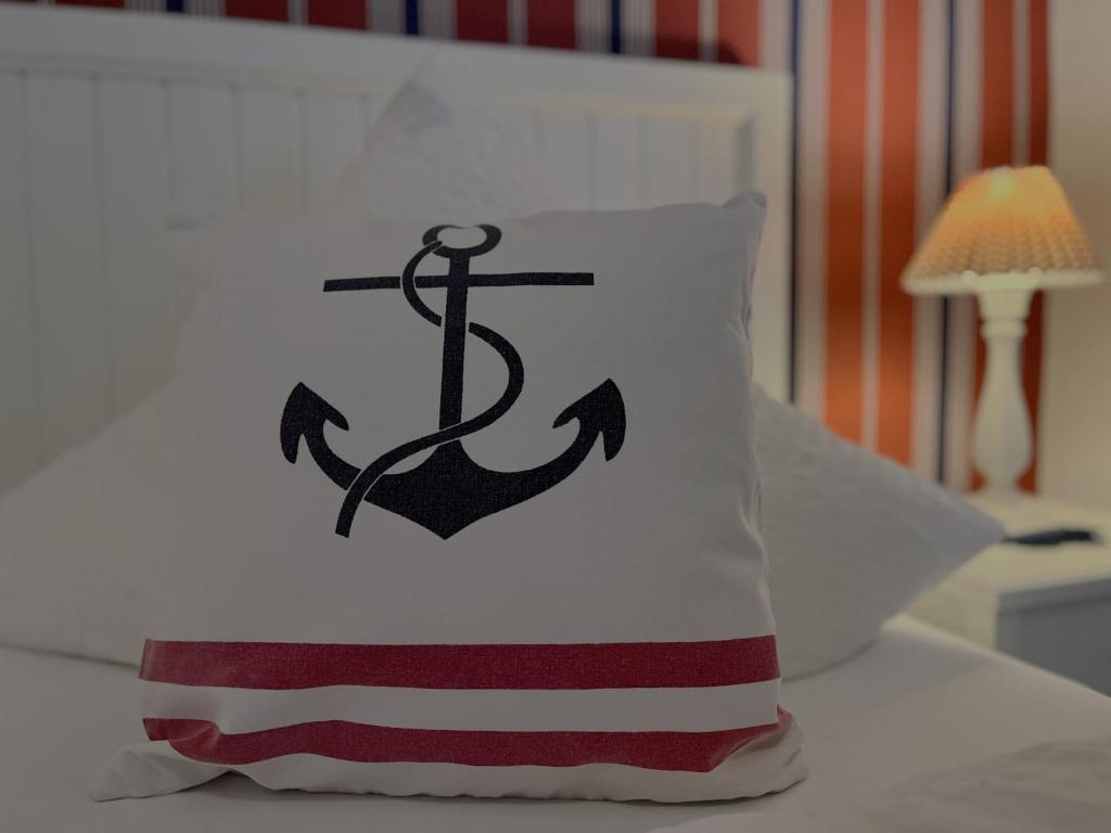 Postel nebo postele na pokoji v ubytování Hotel Anka