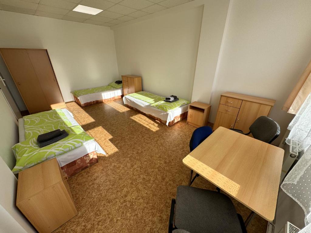 Postel nebo postele na pokoji v ubytování D8 APARTMÁNY