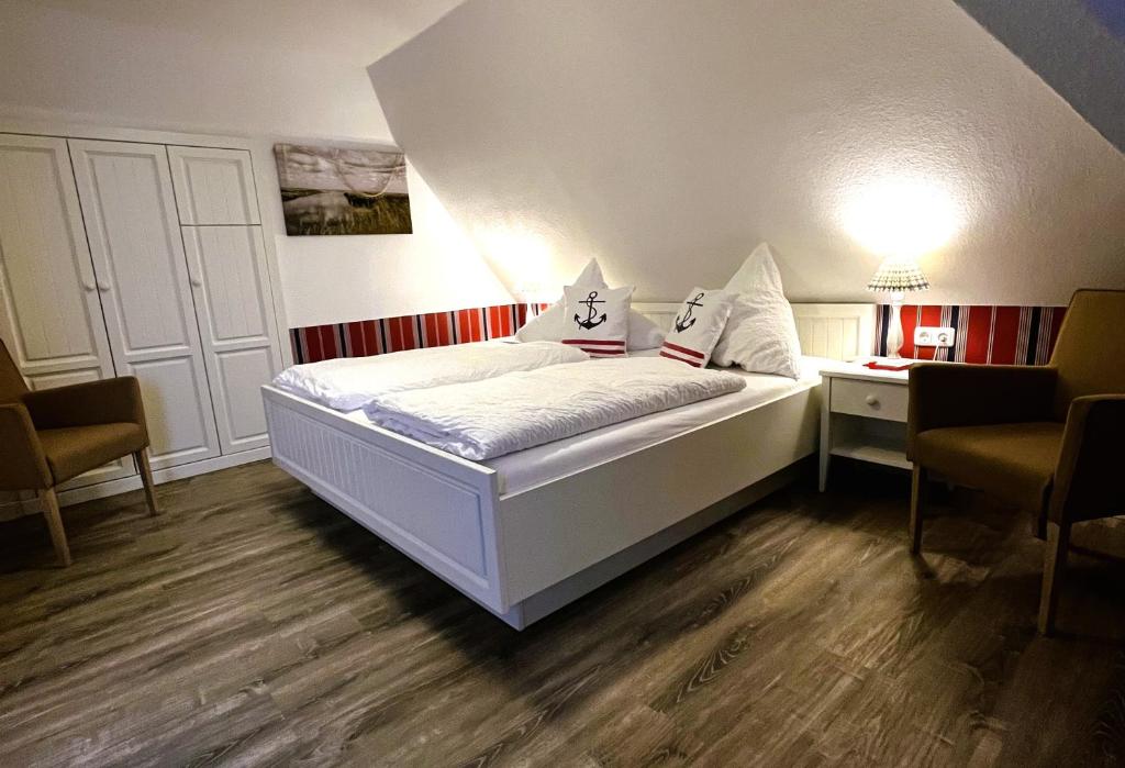 Postel nebo postele na pokoji v ubytování Hotel Anka