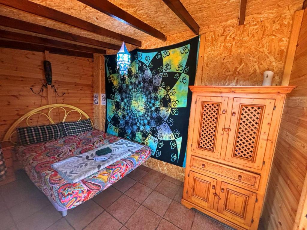 Postel nebo postele na pokoji v ubytování Hostel Los Duendes del Sur