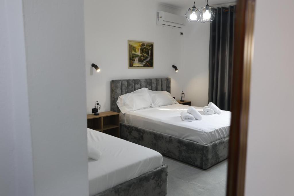 Postel nebo postele na pokoji v ubytování VILA ALIZEE Hotel