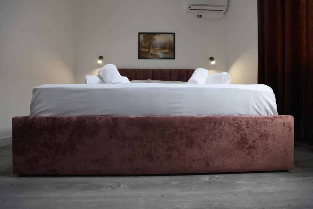 Postel nebo postele na pokoji v ubytování VILA ALIZEE Hotel