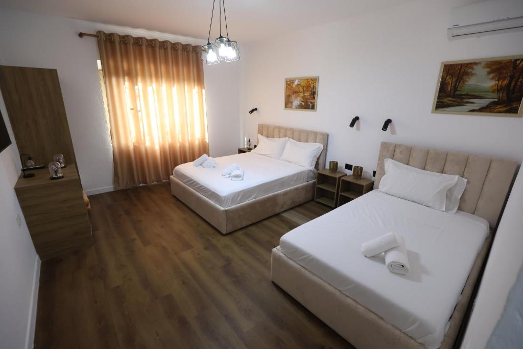 Postel nebo postele na pokoji v ubytování VILA ALIZEE Hotel