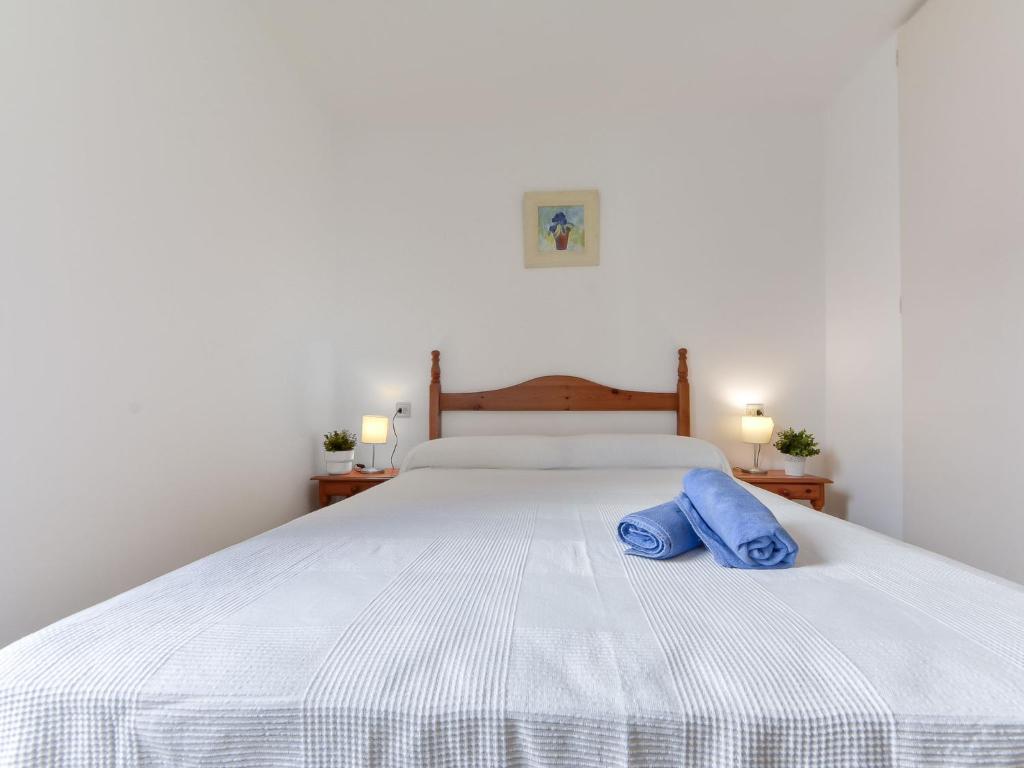 Postel nebo postele na pokoji v ubytování Apartment Platja de Roses-10 by Interhome