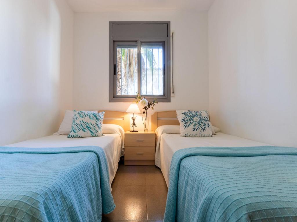 Posteľ alebo postele v izbe v ubytovaní Holiday Home Gaviota 7 by Interhome