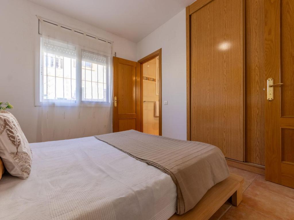 Posteľ alebo postele v izbe v ubytovaní Holiday Home Sally by Interhome