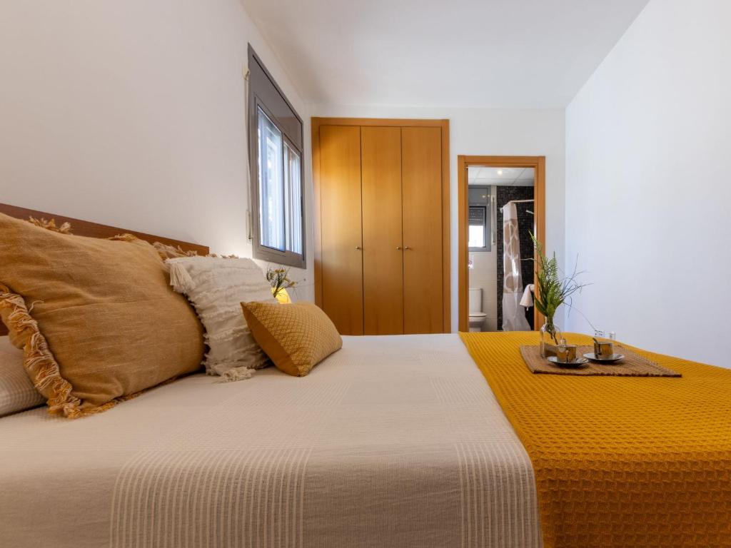 Postel nebo postele na pokoji v ubytování Holiday Home Gaviota 14 by Interhome