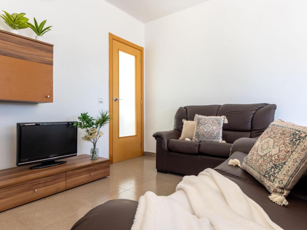 TV a/nebo společenská místnost v ubytování Holiday Home Gaviota 14 by Interhome