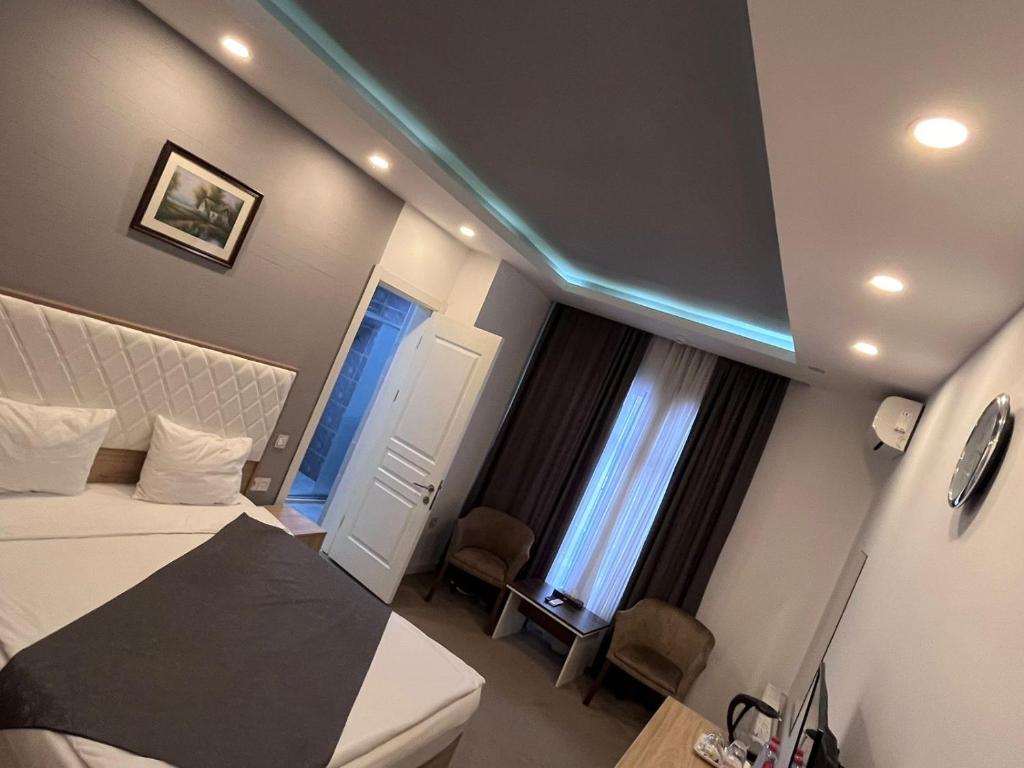 Postel nebo postele na pokoji v ubytování ZamZam-Madina Halal Hotels Group