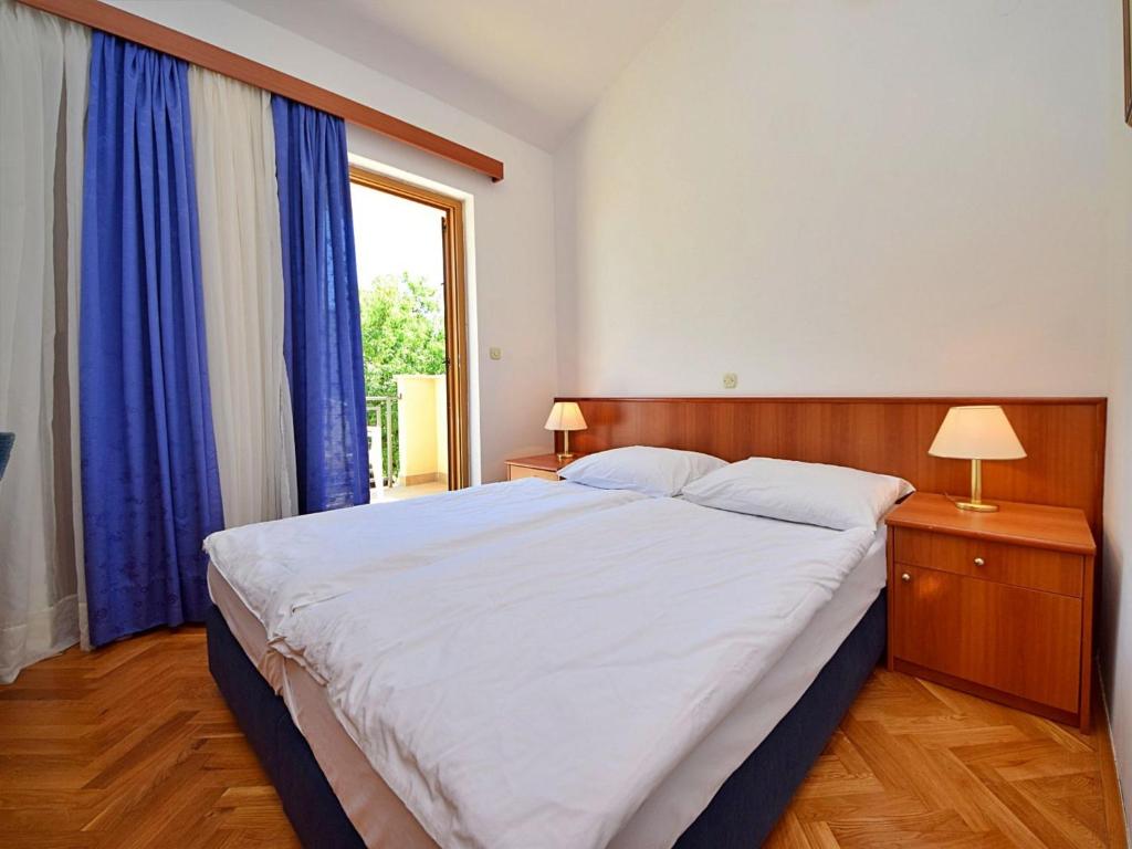 Posteľ alebo postele v izbe v ubytovaní Apartment Meridiana-4 by Interhome