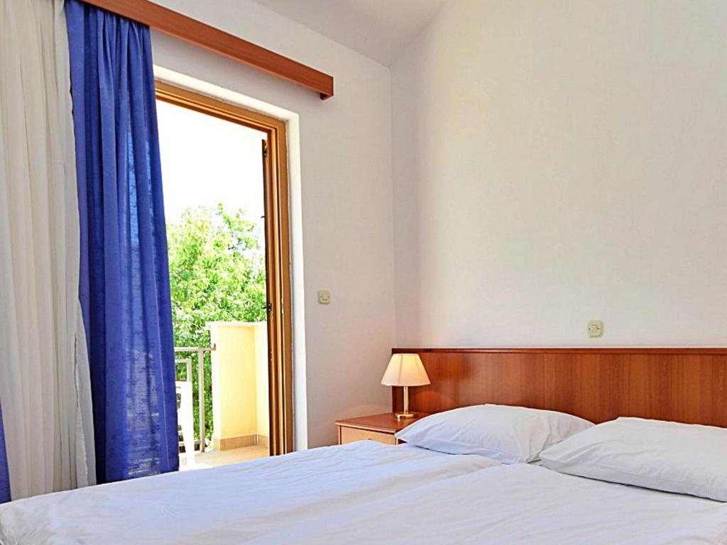 Posteľ alebo postele v izbe v ubytovaní Apartment Meridiana-4 by Interhome