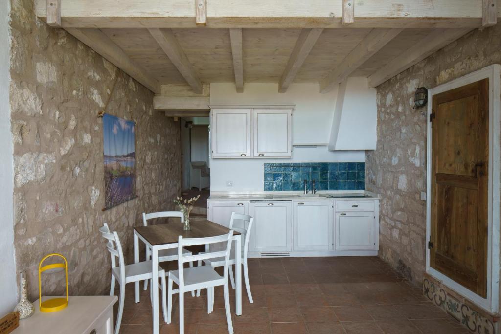 Kuchyň nebo kuchyňský kout v ubytování Residenza A Cova