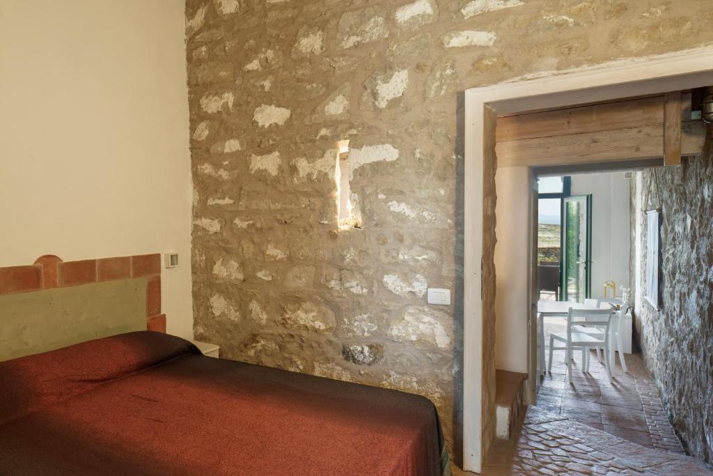 Postel nebo postele na pokoji v ubytování Residenza A Cova
