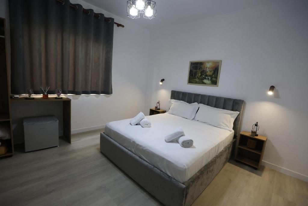 Postel nebo postele na pokoji v ubytování VILA ALIZEE Hotel