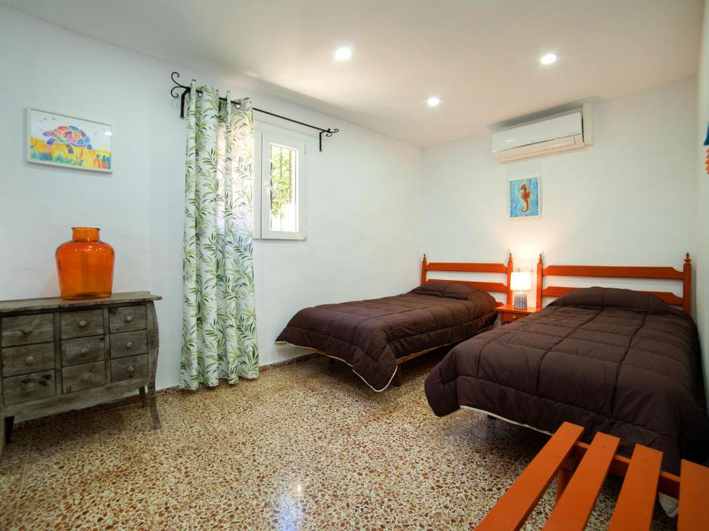 Posteľ alebo postele v izbe v ubytovaní Villa La Paz by Interhome