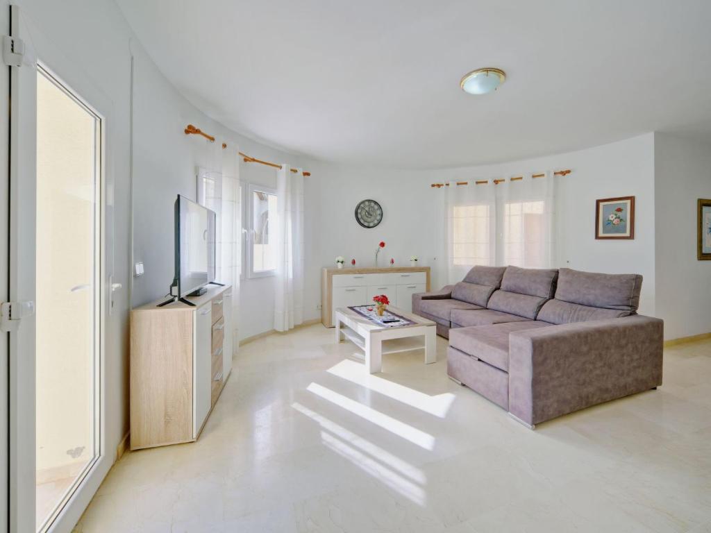 A television and/or entertainment centre at Holiday Home Cucarres by Interhome
