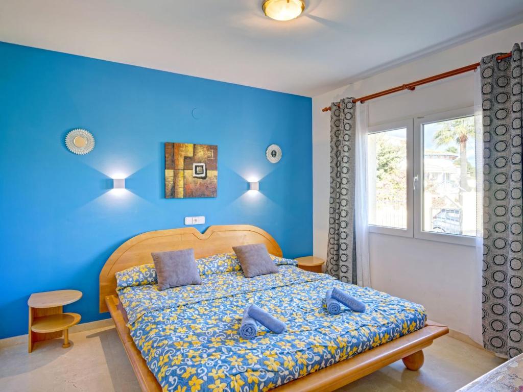 A bed or beds in a room at Holiday Home Cucarres by Interhome