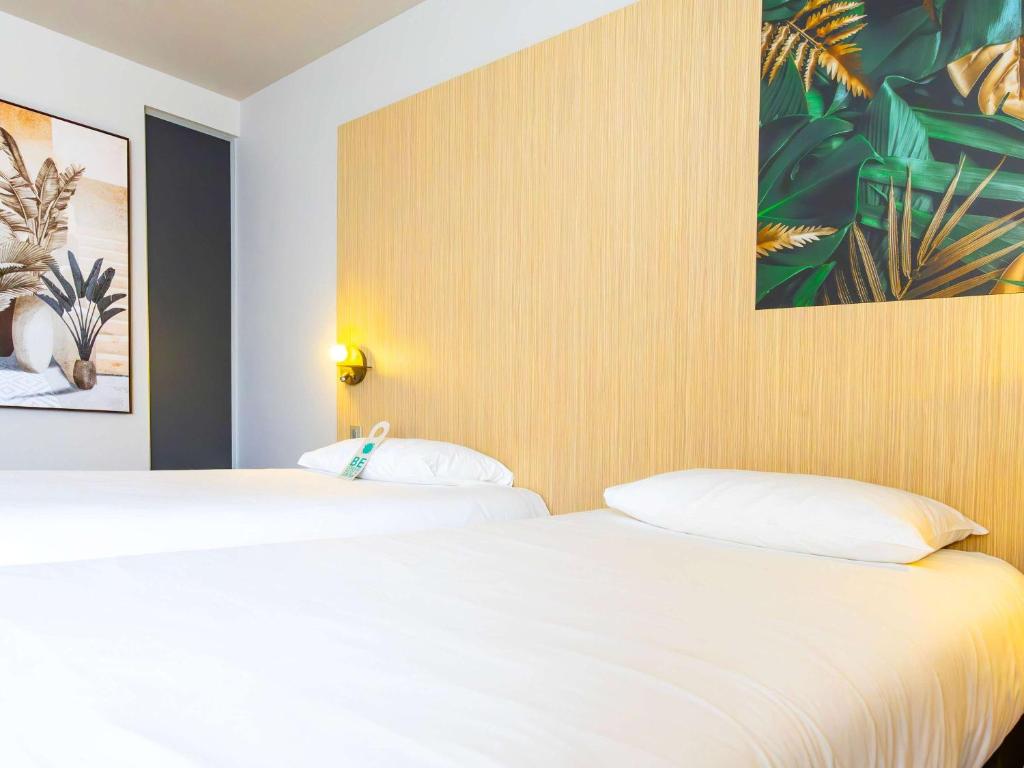 Postel nebo postele na pokoji v ubytování ibis Styles Troyes Centre