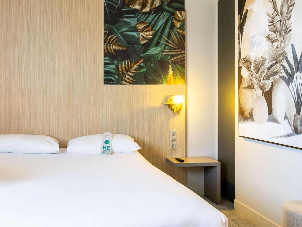 Postel nebo postele na pokoji v ubytování ibis Styles Troyes Centre