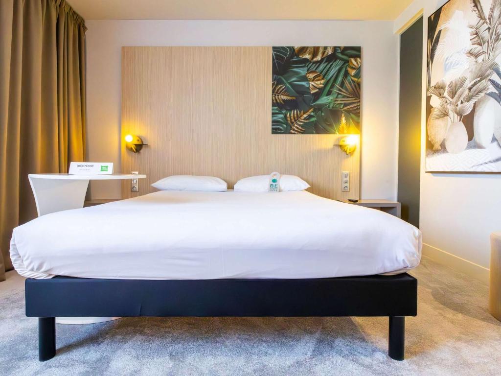 Postel nebo postele na pokoji v ubytování ibis Styles Troyes Centre
