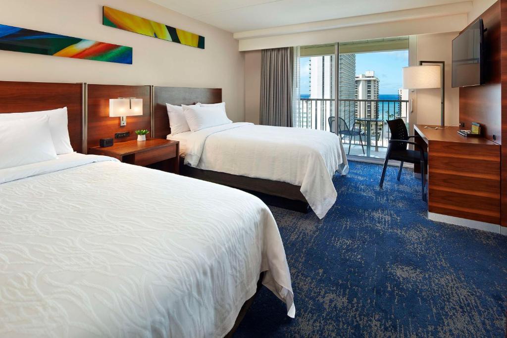 Hilton Garden Inn Waikiki Beach - Suite With Two Double Beds And One Sofa Bed With Partial Ocean View