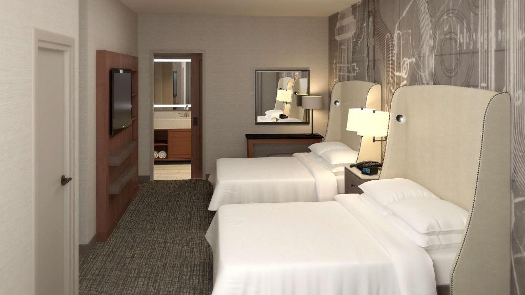 Postel nebo postele na pokoji v ubytování Embassy Suites By Hilton Berkeley Heights