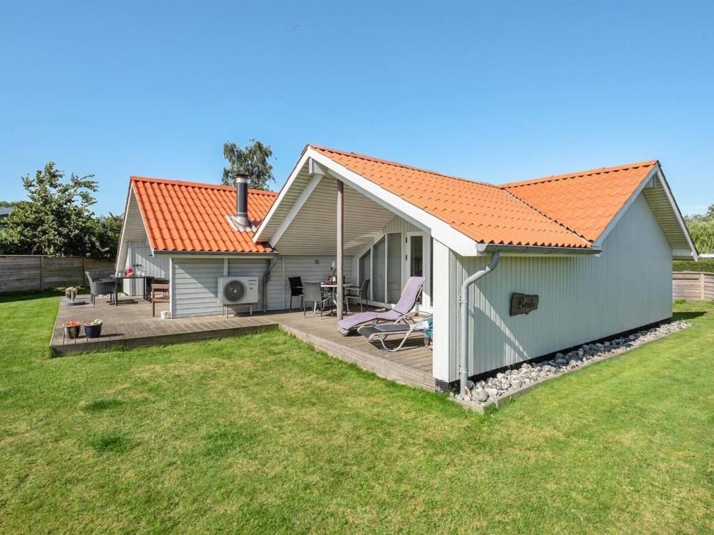 an image of a house with an orange roof at Holiday Home Katrina - 50m to the inlet in SE Jutland by Interhome in Broager