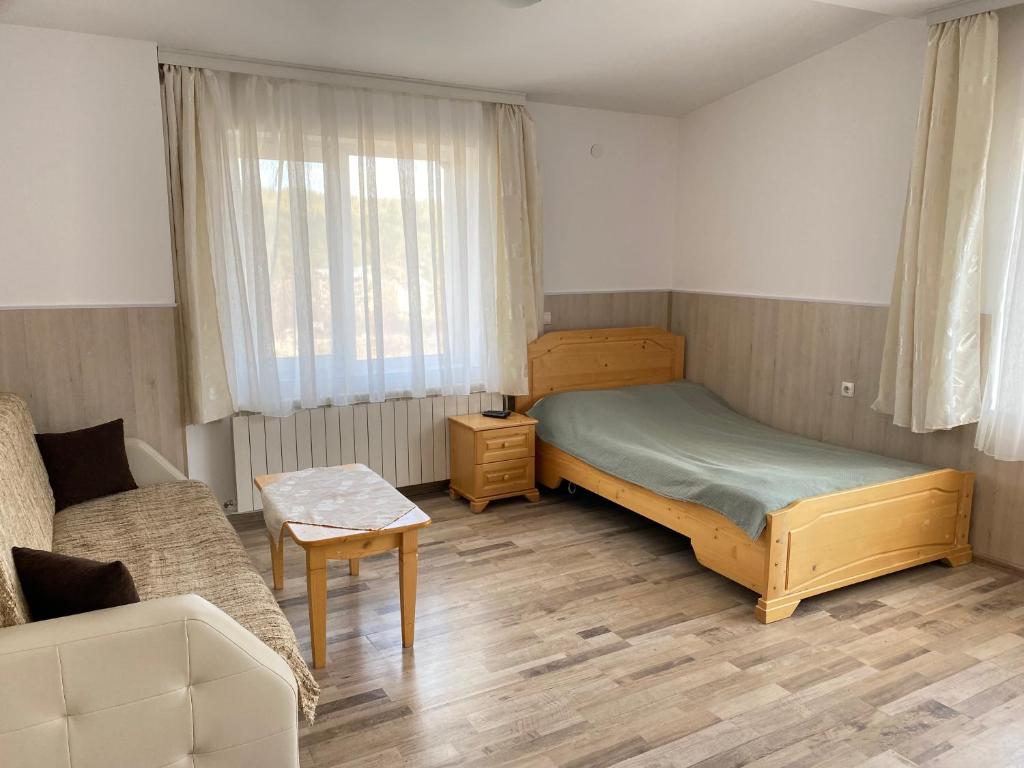Postel nebo postele na pokoji v ubytování Къща за гости "Марина ливада"