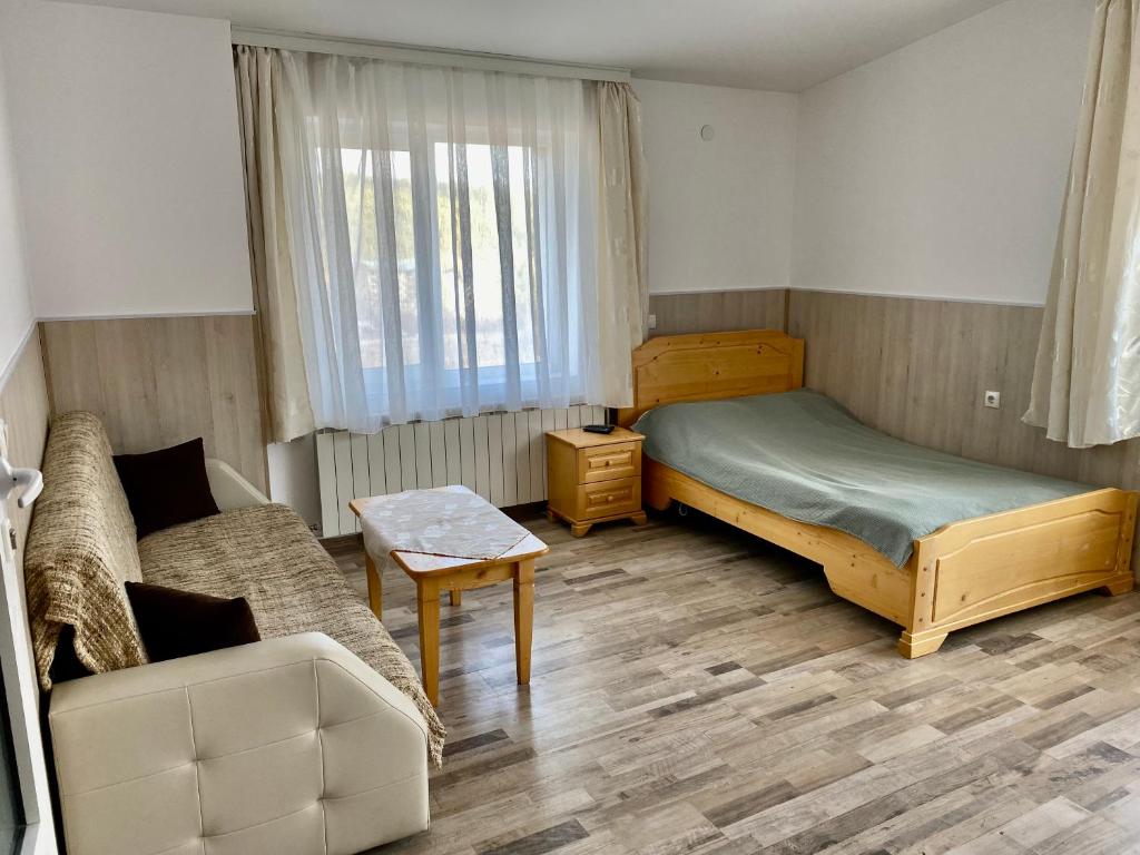 Postel nebo postele na pokoji v ubytování Къща за гости "Марина ливада"