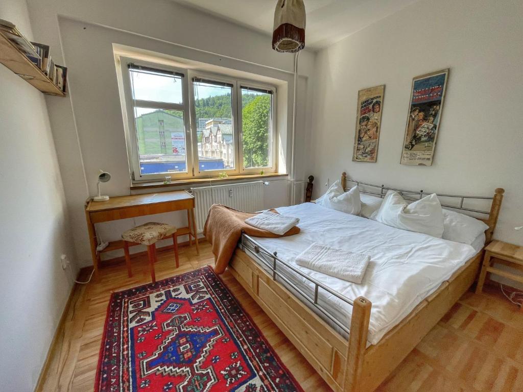 Een bed of bedden in een kamer bij Apartment Family & bike by Interhome