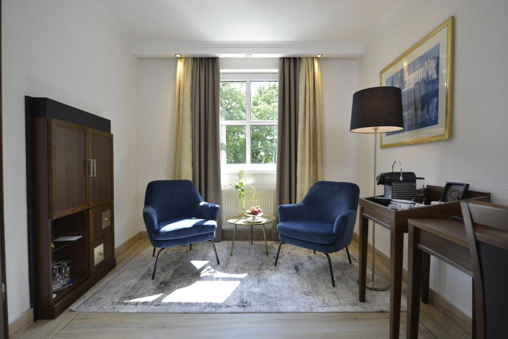 TV a/nebo společenská místnost v ubytování Hotel Caroline Mathilde