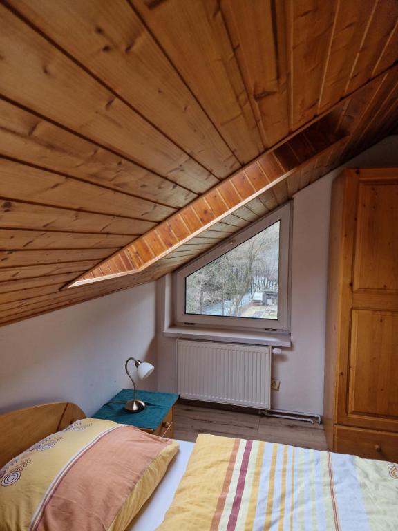 Postel nebo postele na pokoji v ubytování Pri Piecke penzión a reštaurácia