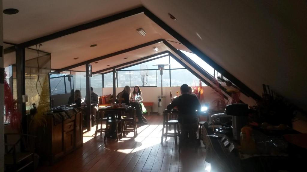 Restoran või mõni muu söögikoht majutusasutuses Hatun Quilla