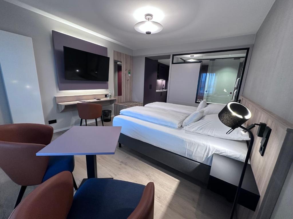 Postel nebo postele na pokoji v ubytování Apartment-Hotel Hamburg Mitte