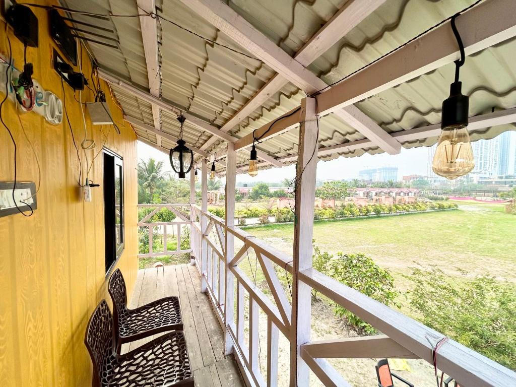 Balkón nebo terasa v ubytování Palli Bangla Resort, near Ruby Hospital, Anandapur