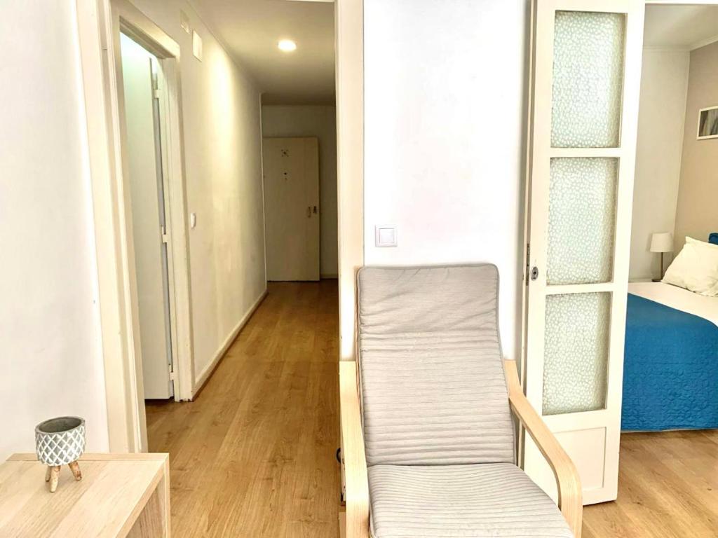 Postel nebo postele na pokoji v ubytování Central Avenida Liberdade 2