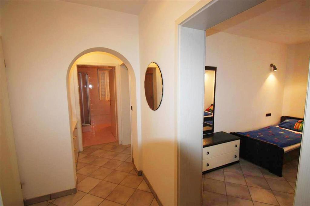 Posteľ alebo postele v izbe v ubytovaní Apartments in Rabac 39139