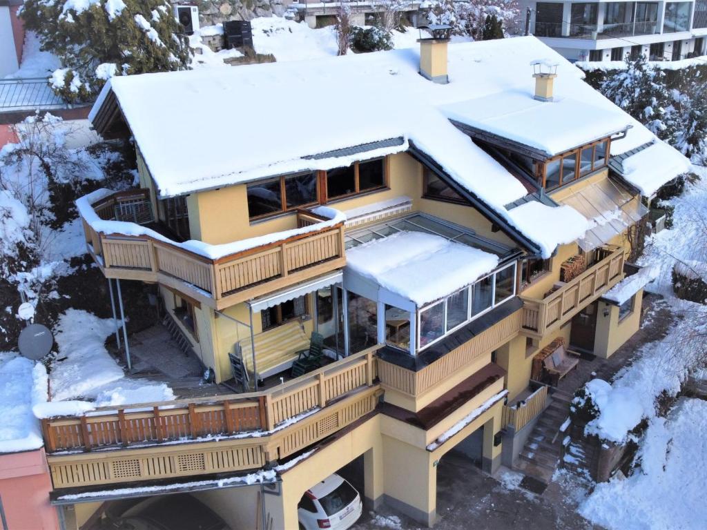 an aerial view of a house covered in snow at Apartment Hannelore by Interhome in Omes