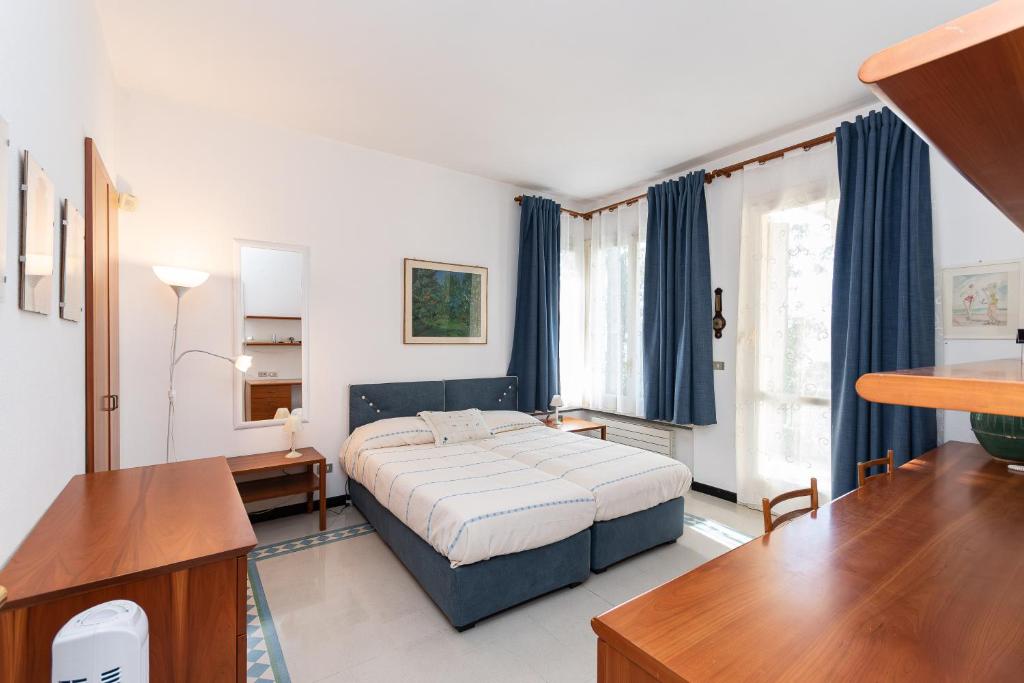 Postel nebo postele na pokoji v ubytování Villa Nettuno- Bluchalet