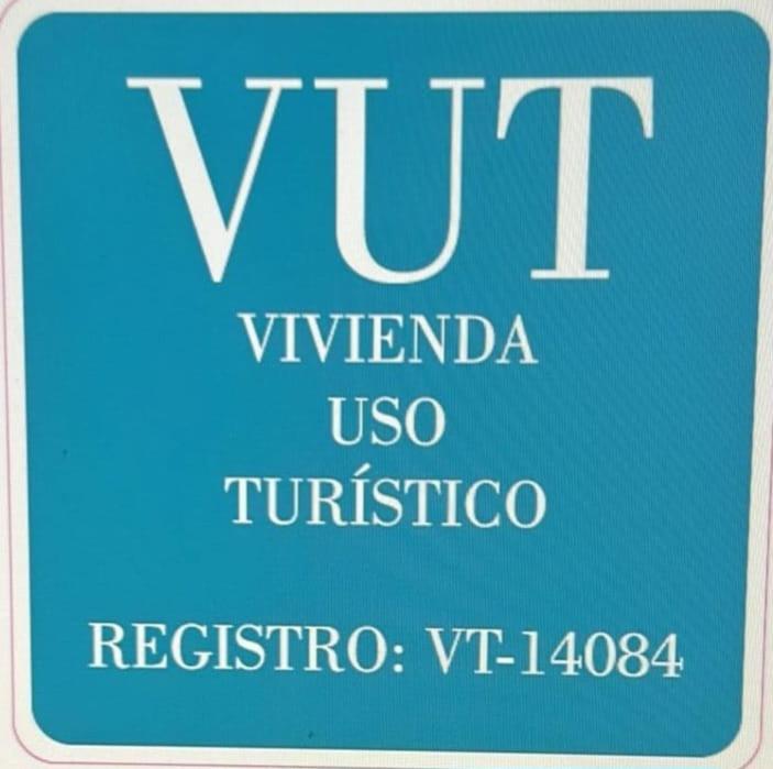 a blue sign with the words vivirviavia usotnc at VOLPI MAZZO in Madrid