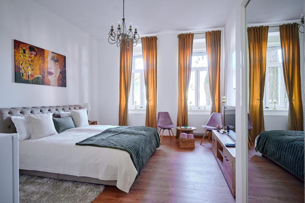 Кровать или кровати в номере Čudesni drvored
